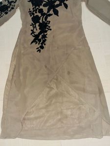 Elegant Beige Tunic with Black Embroidery