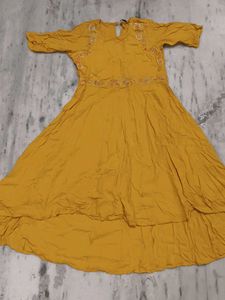 Girls wear Mustard Embroidered A-Line Kurta with s
