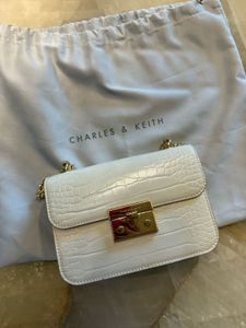 OFF WHITE CHARLES AND KEITH (check Description)