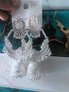 three long Elegant Silver Jhumka Earrings