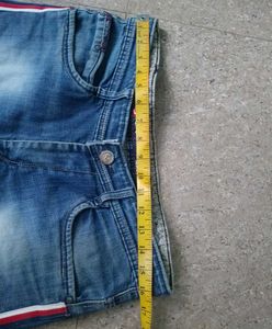 Distressed Jeans with Red and White Stripe