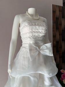 VOLUMINOUS RUFFLED ORGANZA WEDDING GOWN