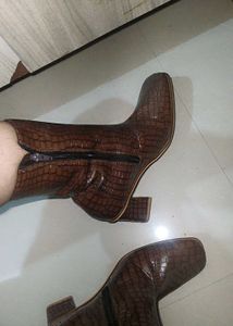 brown printed leather Hi neck boots....