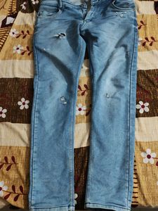 Distressed Denim Jeans