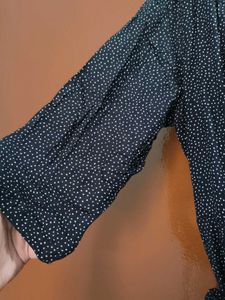 POLKA DOT WRAP DRESS. .
