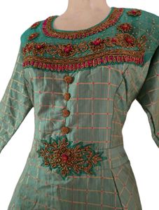 Elegant Green Dress with intricate embroidery