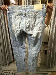 Distressed Denim Jeans