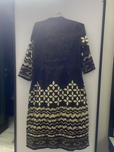 Brown 40 size Kurti with sequence work on neck