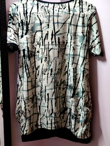 Patterned top with crystals