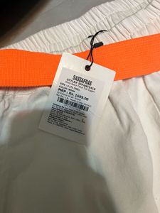 White High-Waisted Cotton Pants with Orange Belt