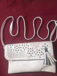 Chic Peach Clutch with Floral Detail