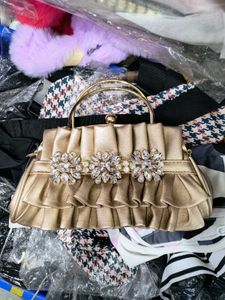 Elegant Gold Crystal Clutch