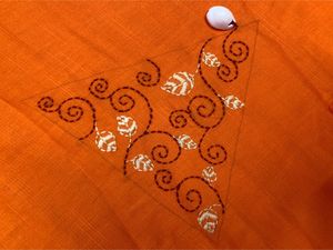 HANDWORK ORANGE SLEEVELESS KURTI