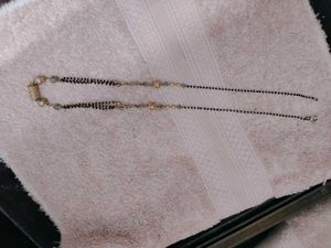 Elegant Mangalsutra and rhinestone snake bracelet