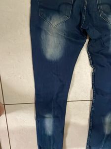 Distressed Denim Jeans