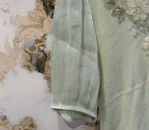 mint green knit top with embroidery