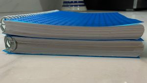 Two Blue Spiral Notebooks