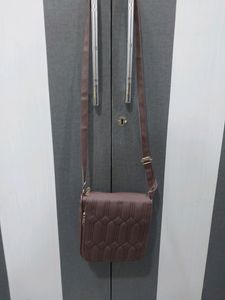 BRAND NEW SLING BAG.