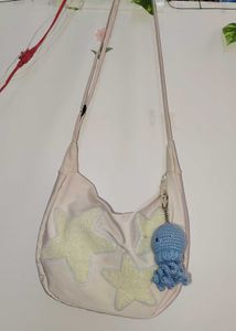 StyleCast x Revolte Hobo Bag