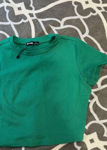 Bonkers Corner Green Ribbed Baby Tee