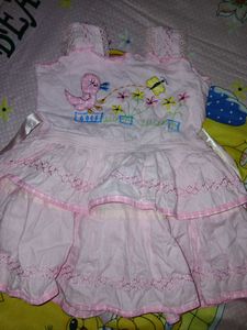 two baby girl dresses are there