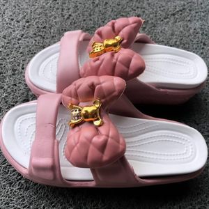 Pink Bowtie Platform Slides