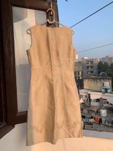 Elegant Sleeveless Beige Dress