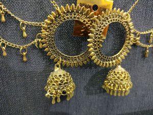 Gold tonned earrings with ear Chain