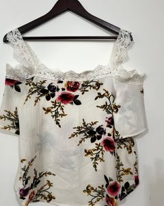 White Floral off-shoulder Top. No stains or damage. Never worn. Good as new!!