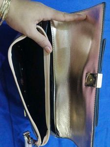 Metallic Bow Clutch