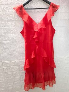 Red Dress With Frills And Deep Back