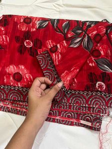 new red printed saree