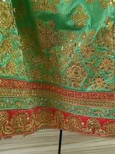 EMBELLISHED SILK LEHENGA IN PINK GREEN AND GOLDEN