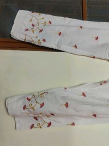 White Plazzo Having Floral Embroidery.