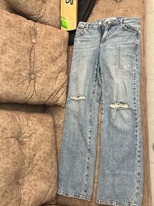 Ripped Knee Denim Jeans