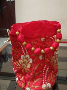 lowest price red and golden potli bag