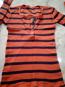 orange pretty top.