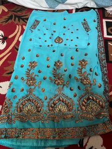Traditional Turquoise Embroidered Saree with Golde