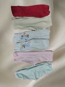 Many new born Frocks And Pants.