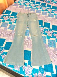 Ripped Bell Bottom Jeans