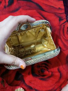 golden daimon clutch