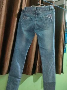 Ripped Blue Denim Jeans