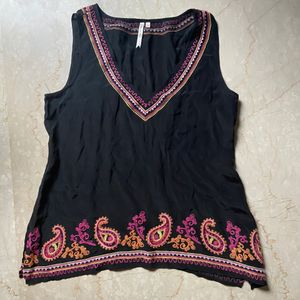 Embroidered sleeveless top