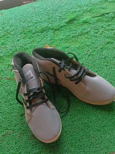 Man And Woman Sports Shoes