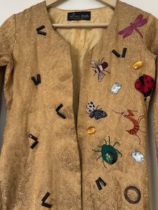 Our custom Neha Kakkar jacket in gold