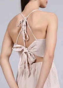 Beige Romper with Ruffle Detail