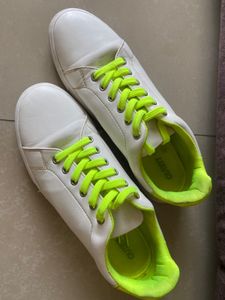 White Sneakers with Neon Green Accents