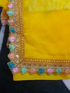 Yellow Georgette Saree With printed blouse(new)