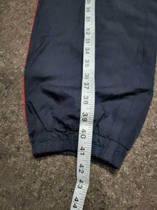 Track Pants with Red and White Stripe