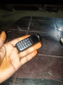 Mini KECHADDA Phone with Charger